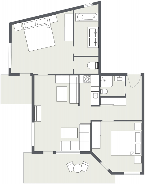 Schwarz-weißer Grundriss des Apartments Samnaun mit zwei Schlafzimmern, Küche und Wohnbereich.