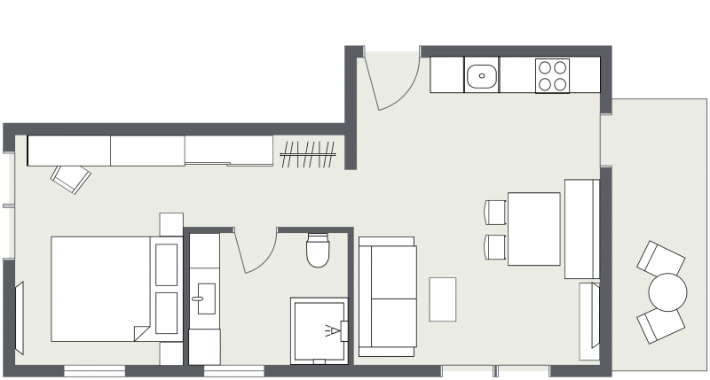 Grundriss der Ferienwohnung Samnaun: Ein-Schlafzimmer mit Küche, Bad, Wohn- und Essbereich.