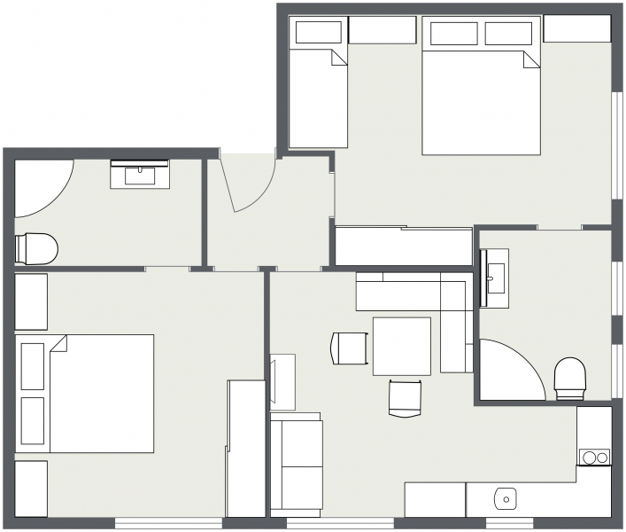 Wohnung Samnaun Grundriss mit zwei Schlafzimmern, Bad, Küche und Wohn-/Essbereich.