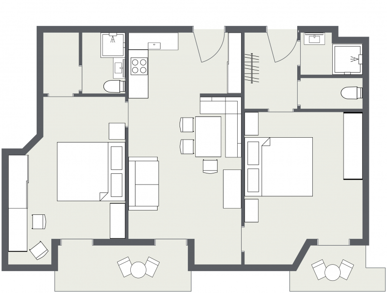 Grundriss des Apartments Samnaun: zwei Schlafzimmer, Küche, Essbereich und zwei Balkone.