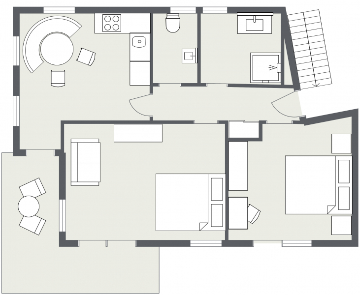 Schwarz-weißer Grundriss der Ferienwohnung Samnaun, einer Zwei-Zimmer-Wohnung mit Wohnbereich.